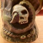 Close up of skull on Sea Horrors mug